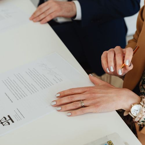 Legal documents on a desk during a professional consultation.