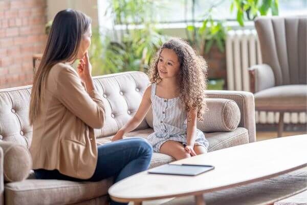 speech therapist working with child