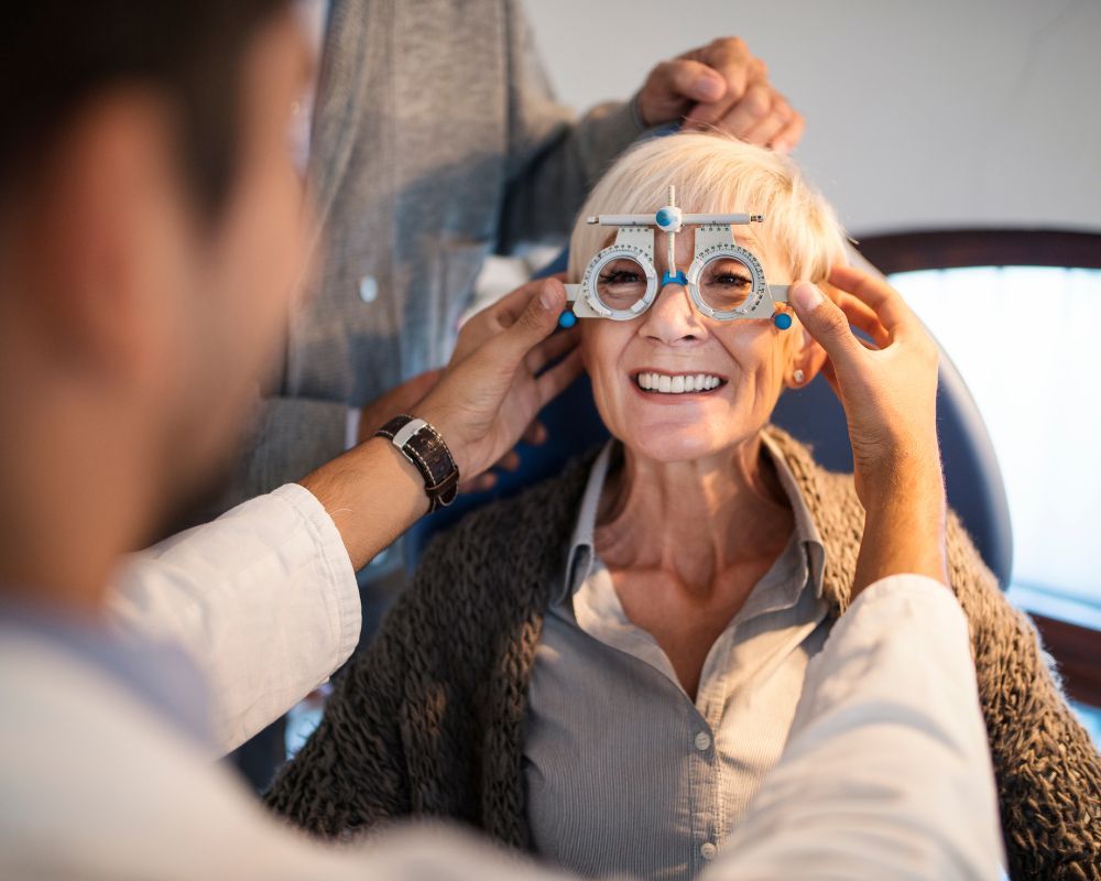 Elderly woman getting eye exam