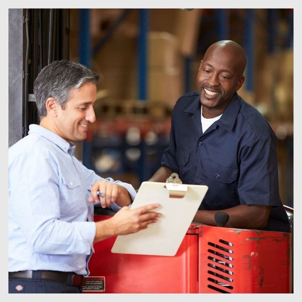 supply chain workers talking