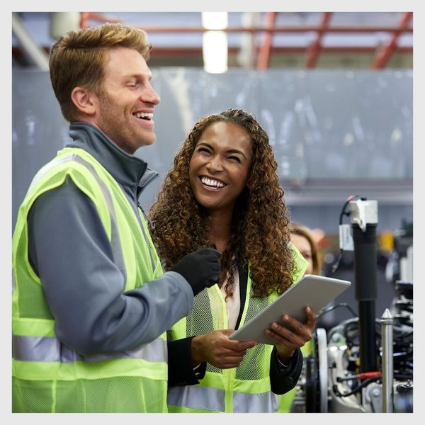 supply chain workers laughing