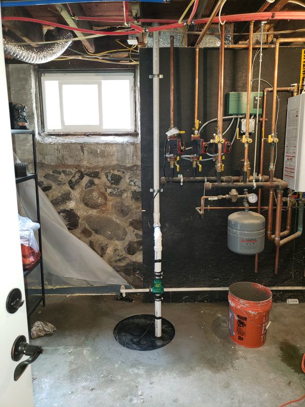 basin-tank-and-sump-pump-installation-basement-after.jpg