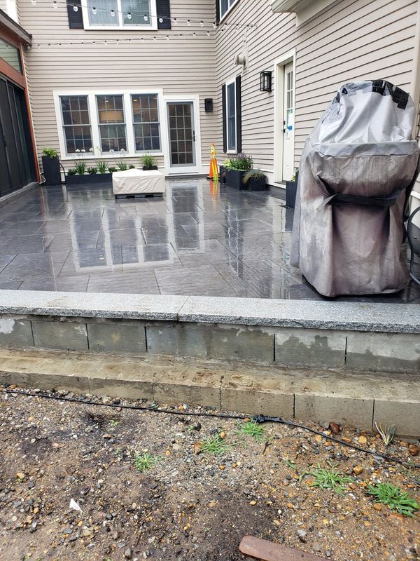 new-outside-patio-with-natural-gas-fireplace-after.jpg