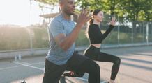 two people working out outside