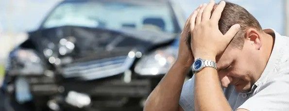man after car accident