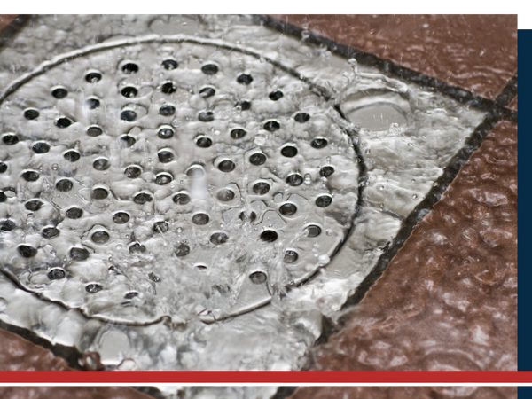Water swirling down a drain