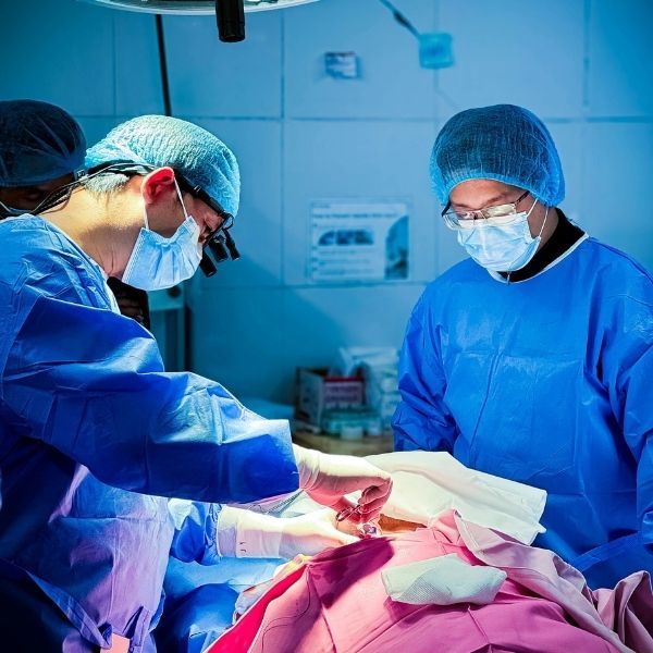 surgeons operating on a patient. 