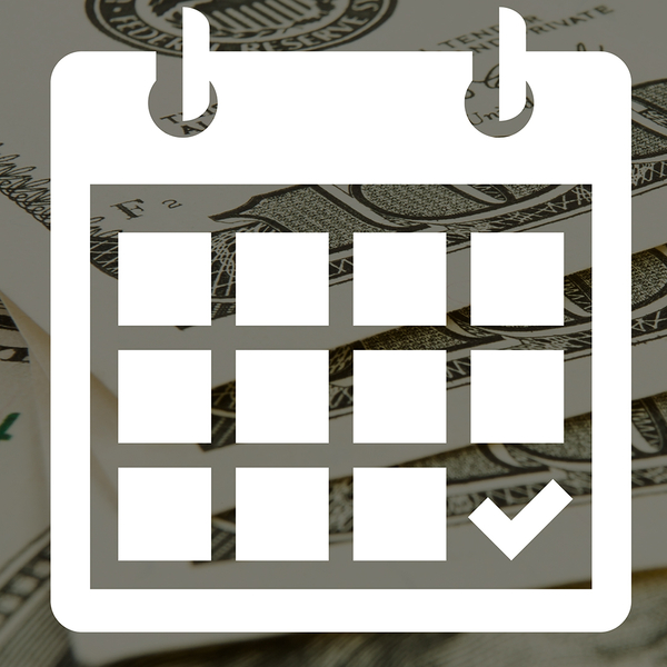 Image of a calendar with a money backdrop