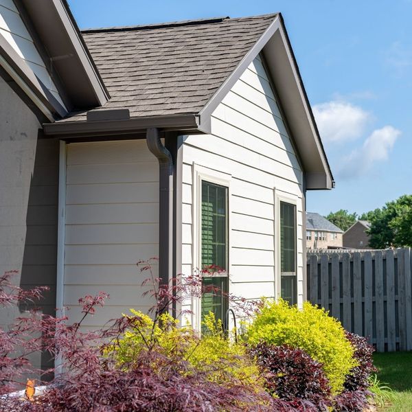 a freshly painted home exterior in the sun