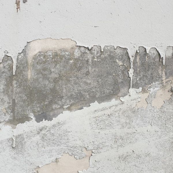 paint flaking off of a wall
