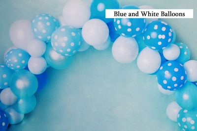blue and white balloons cake smash background
