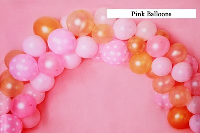 pink and gold balloons cake smash background