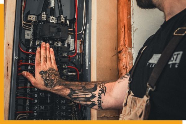 electrician rewiring into the box