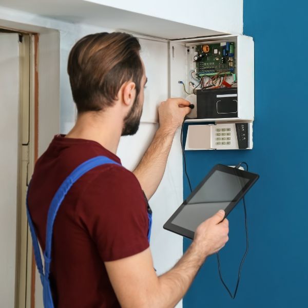 electrician checking electrical panel