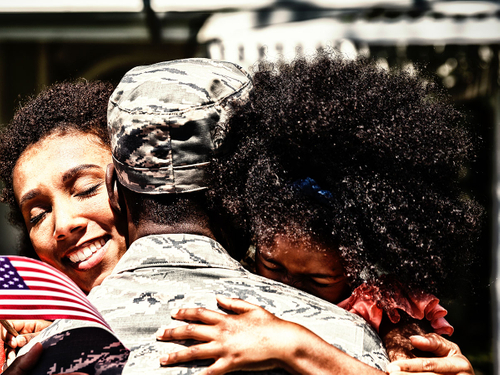 Army Vet hugs family