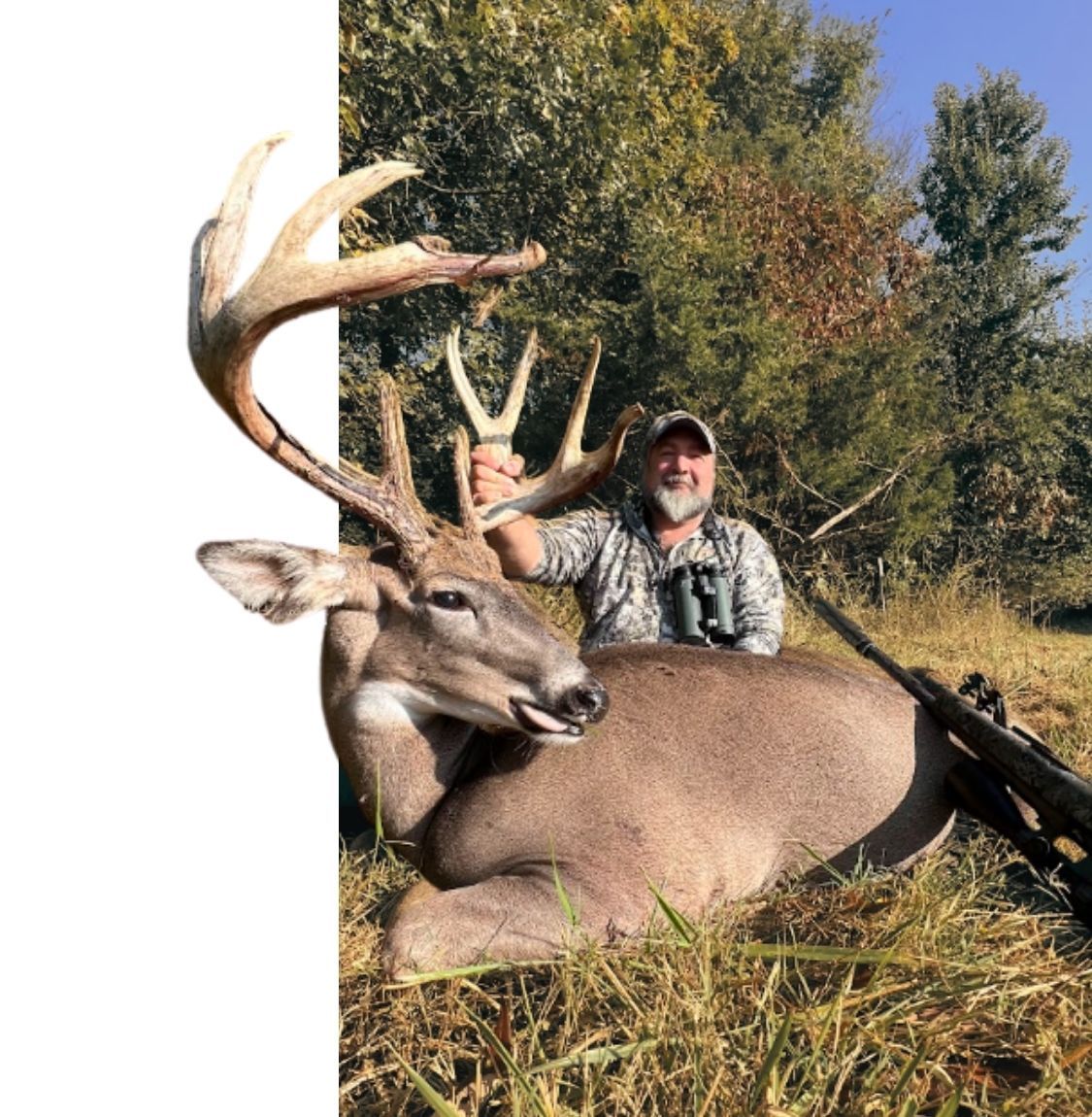 Hunter with large trophy buck 