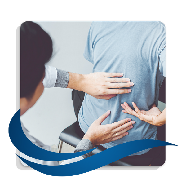 photo of man in blue shirt showing the chiropractor his back pain
