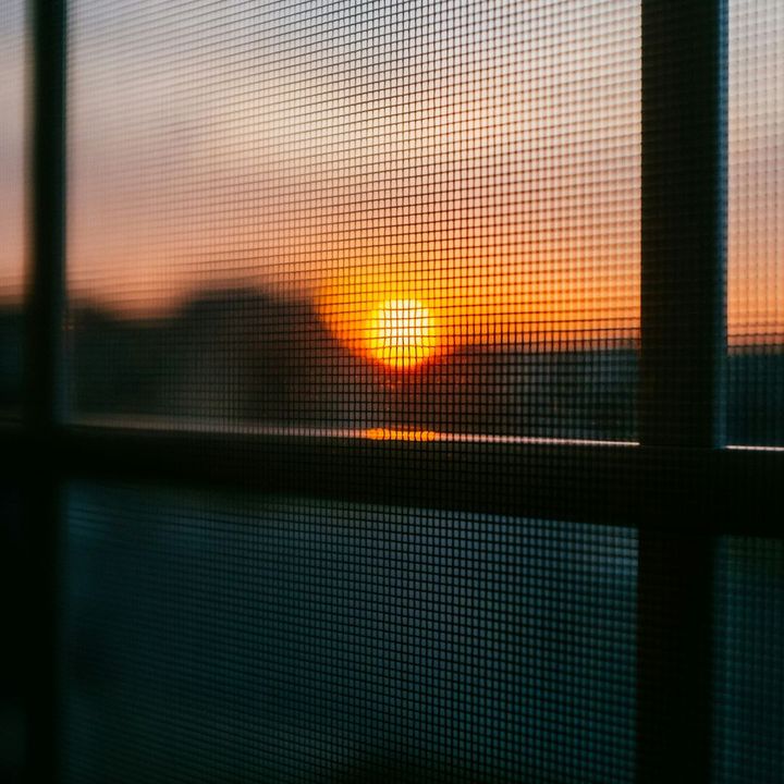 sunset through window screen sunset through window screen