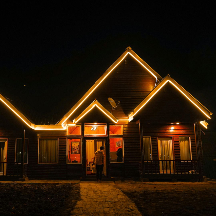 home with exterior lighting
