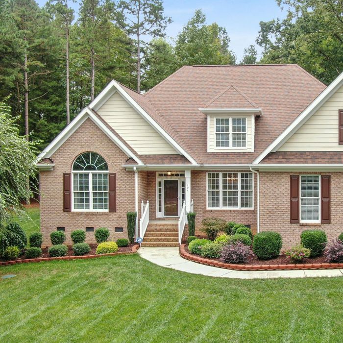 A house with a well maintained yard