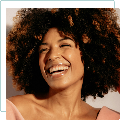 woman smiling with glowing skin woman smiling with glowing skin