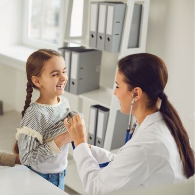 happy child at check up feeling better happy child at check up feeling better