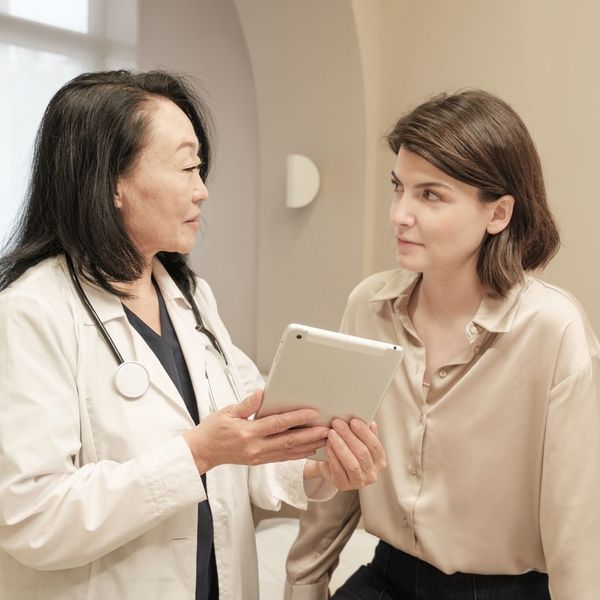 woman talking to her doctor