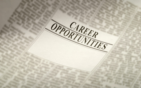 A newspaper with an advertisement that says “Career Opportunities”