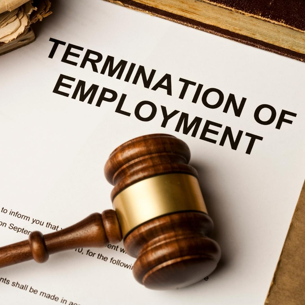 Termination of employment letter with judge's gavel