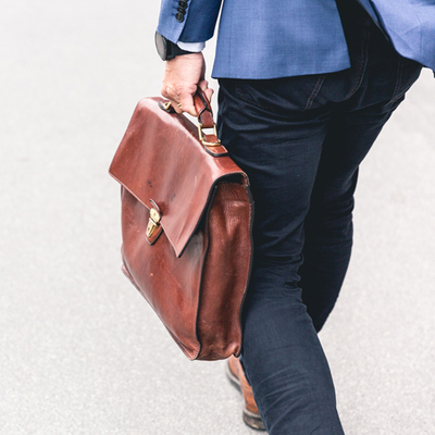 image of a lawyer walking with a briefcase.jpg