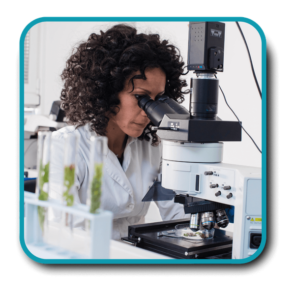 lab tech at microscope