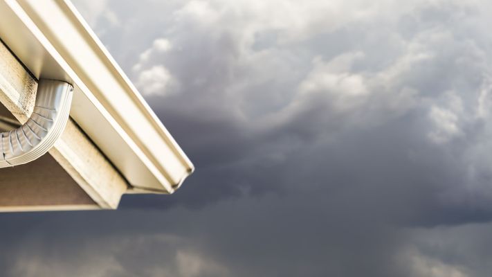 clouds behind gutter