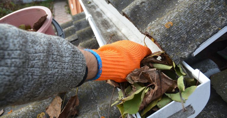 cleaning out gutters