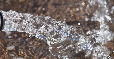 Water flowing from a spout