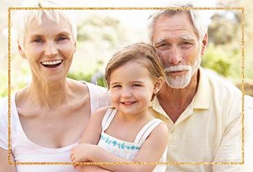 grandparents with grand child