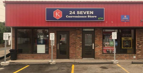 JK 24 SEVEN Convenience Store - Exterior store front with JK icon