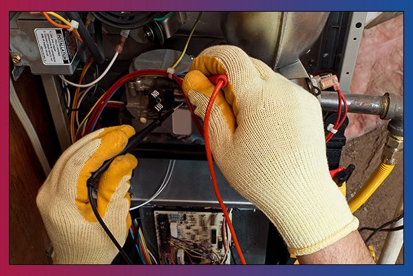 image of a furnace being repaired