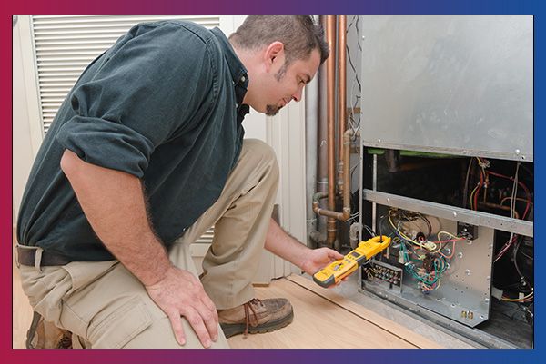 image of a HVAC technician