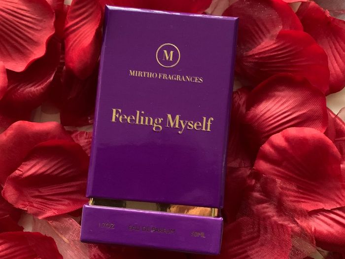 perfume box in rose petals