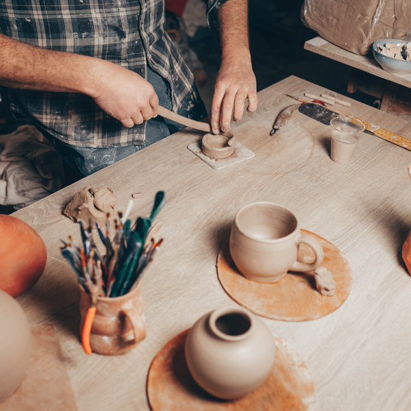 man crafting ceramic gifts. 