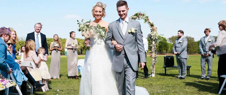 Couple who just got married; walking down the aisle