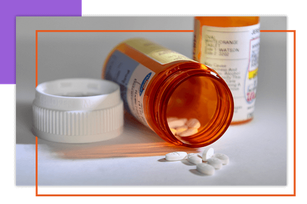 Image of pills and a pill bottle