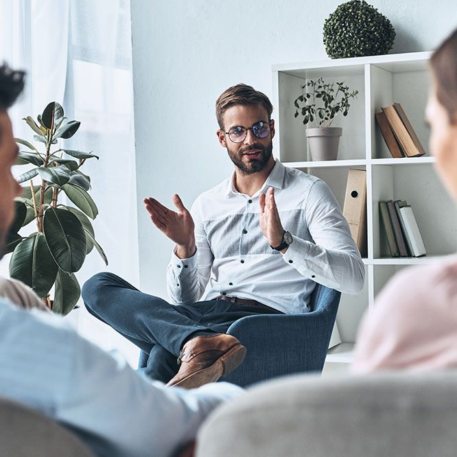 Couple listening to therapist