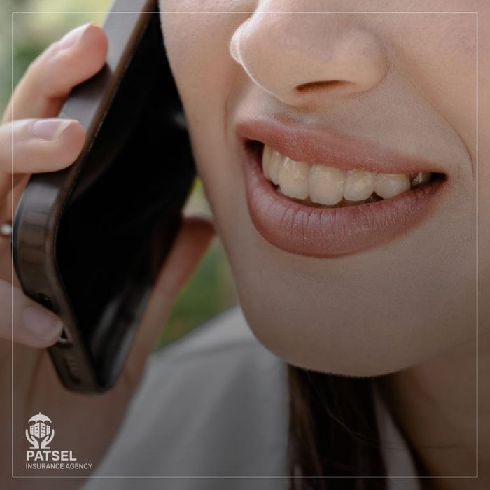 person calling on phone, close-up of mouth and hand holding phone