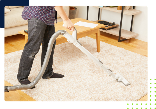 someone cleaning a residential carpet