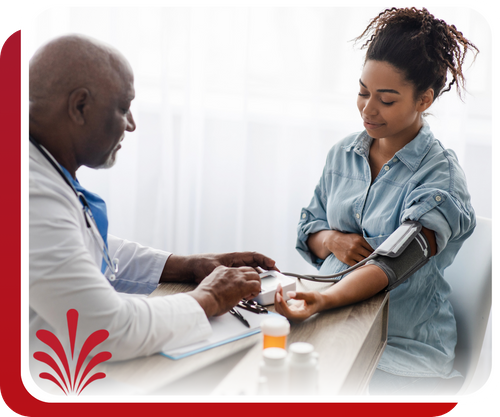 doctor taking a patient's blood pressure