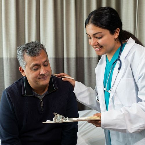 man talking to his doctor man talking to his doctor