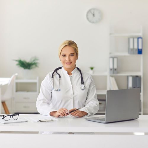 doctor getting ready for a telehealth appointment doctor getting ready for a telehealth appointment