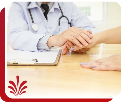 doctor holding a patient's hand