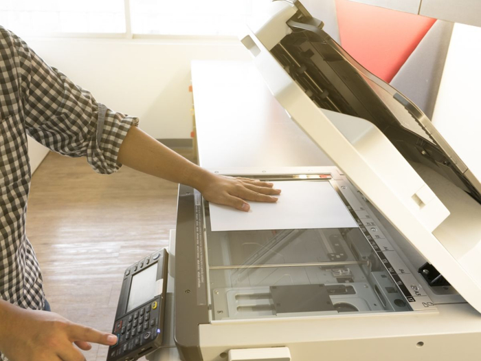 Woman using printer
